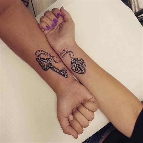 wrist couple tattoos|couples key tattoo designs.